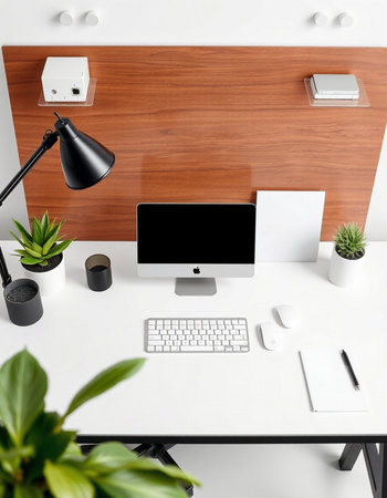 Top view of modern workplace with blank computer screen, stationery and decorations. Mock upの写真素材