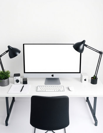 workplace with blank screen computer, lamp and stationery on white background