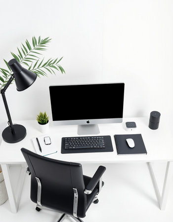 workplace with computer, lamp, keyboard and mouse on white backgroundの写真素材