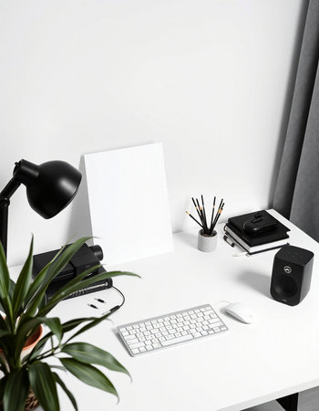 Modern workplace with blank paper, keyboard, mouse, coffee cup and other office supplies on white...