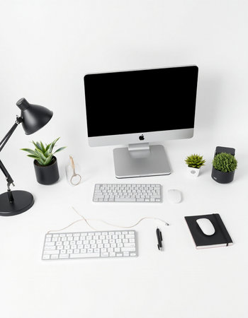 Modern workspace with computer, keyboard, mouse and accessories on white background