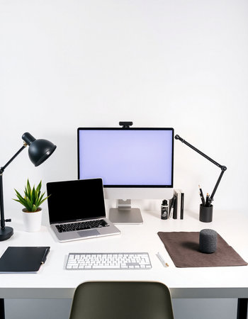 Modern workspace with blank screen computer laptop and other items. Mock upの写真素材