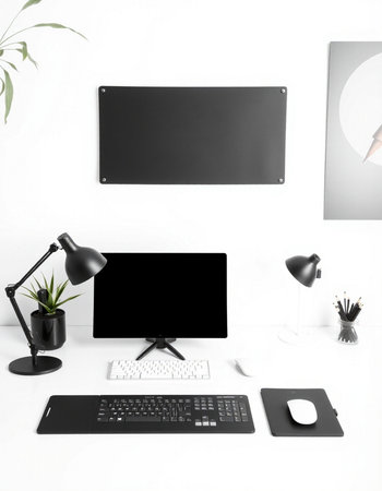 Modern workspace with blank computer monitor, keyboard, mouse, lamp, notebook and stationery on...