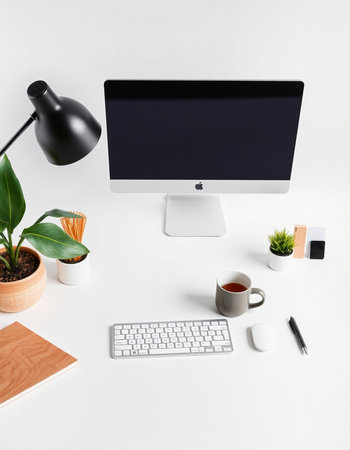 Modern workspace with computer, coffee cup, stationery and plant. Flat lay, top viewの写真素材
