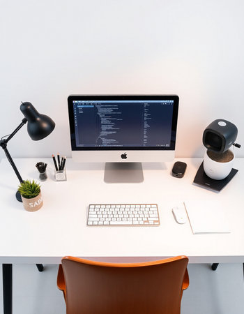 Modern workspace with computer, keyboard and mouse.の写真素材