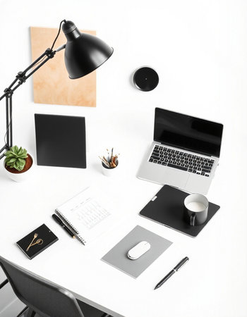 Modern workplace with laptop, stationery and cup of coffee on white background