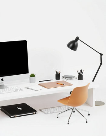 workplace with computer, lamp and stationery isolated on white background