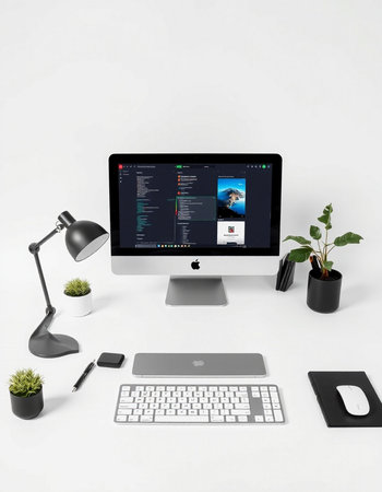 3D rendering of workspace with computer, keyboard, mouse and plantの写真素材