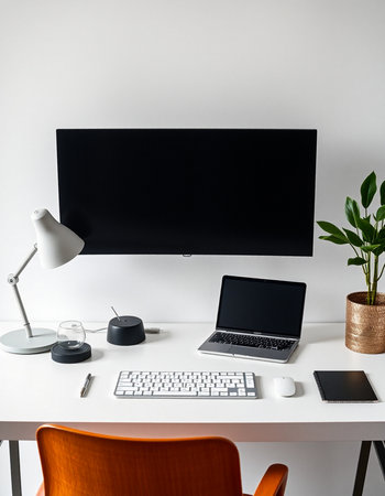 modern workspace with blank screen computer monitor, coffee cup and other items