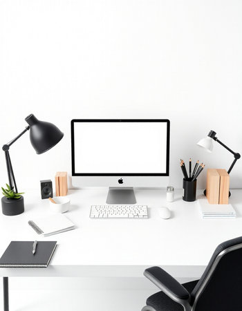 Modern workspace with blank computer screen, stationery and decorations. Mock up