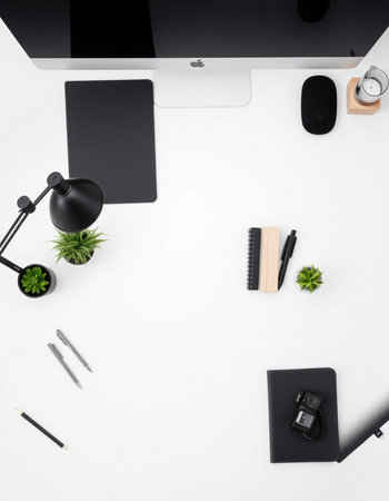 Top view of modern workspace with computer, stationery, supplies and copy space on white background