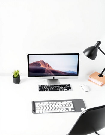Modern workspace with computer, mouse, keyboard and other items on white background