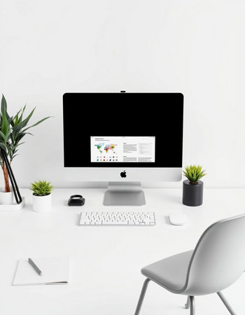 workplace with computer, keyboard, notebook and plant isolated on white