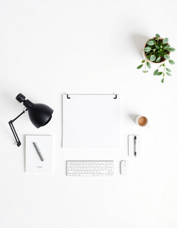 White office desk table with coffee cup, notebook and plant. Flat lay, top view