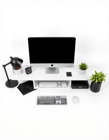 Modern office desk with computer, laptop and coffee cup on white backgroundの写真素材