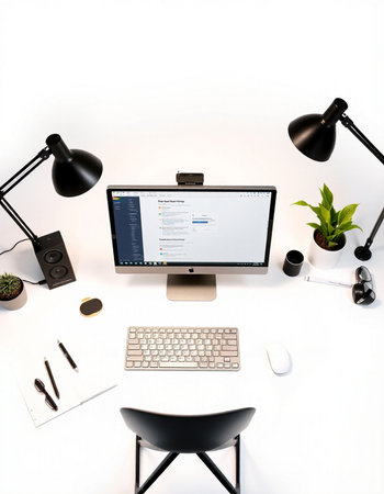 Workplace with computer, stationery and mouse on the white table