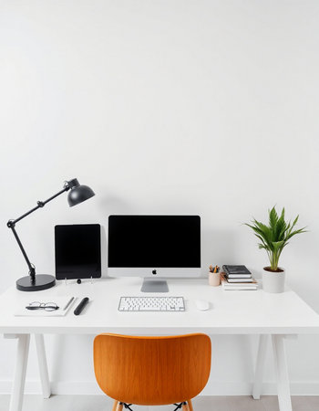 workplace with computer, lamp, keyboard, mouse, lamp and plantの写真素材