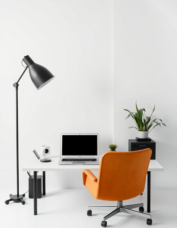 Modern workspace with orange armchair, laptop and coffee cup. 3d renderの写真素材