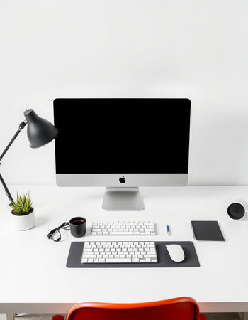 Workplace with computer, coffee cup on white table
