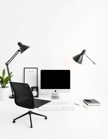 Workplace with computer, stationery and lamp on white wall background