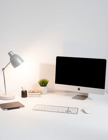 Minimalistic workspace with blank computer screen, keyboard, stationery and coffee cup on white...