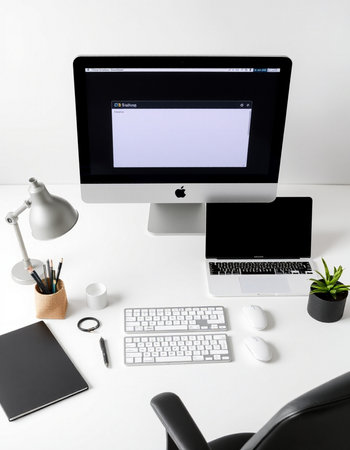 Workplace with computer, keyboard, mouse and notebook on white backgroundの写真素材