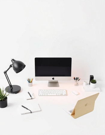 workplace with computer, keyboard, mouse, notebook and lamp on white backgroundの写真素材