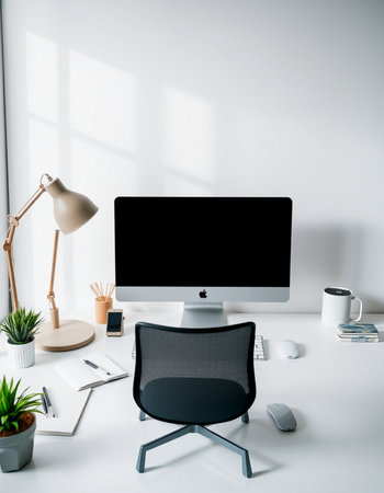 workplace with blank computer monitor, stationery and coffee cup on white table