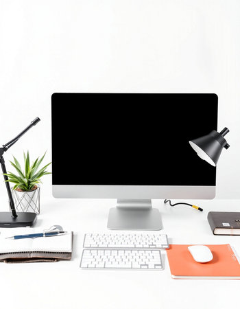 Modern workspace with computer, supplies and stationery on white background.の写真素材