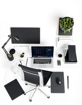 Top view of modern workplace with laptop, tablet, smartphone and office supplies on white backgroundの写真素材