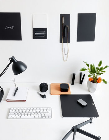 Creative workspace with blank stationery and copy space on white backgroundの写真素材