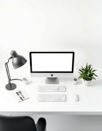 workplace with computer, keyboard, lamp and plant on white background