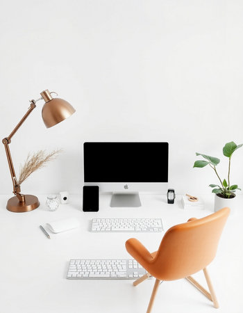Modern workspace with computer, keyboard, stationery and decorations on white backgroundの写真素材
