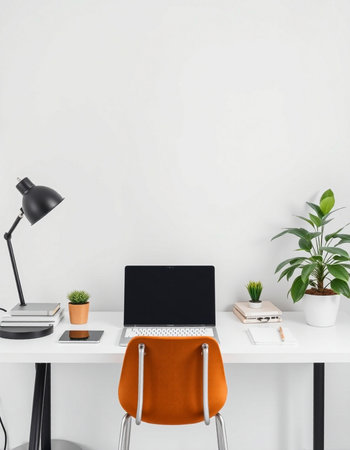 Modern office workplace with laptop, supplies and plants. Workplace conceptの写真素材