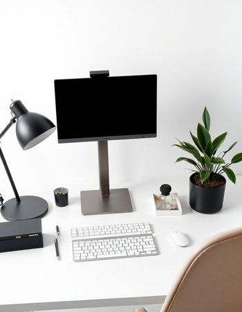 workplace with computer, keyboard, mouse and plant on white background