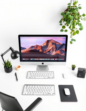Modern workspace with computer, keyboard, mouse and plant. 3d rendering.の写真素材
