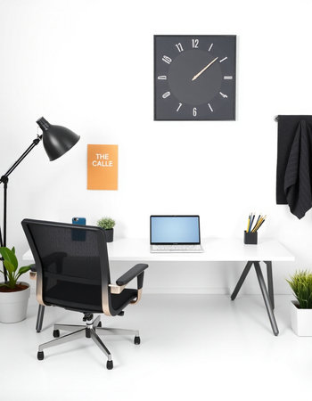 Workplace with laptop, lamp and coffee cup in modern office interior