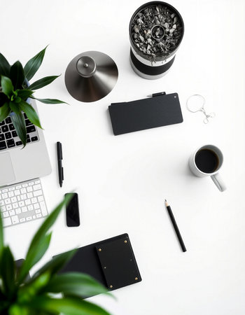 White office desk table with laptop, smartphone and coffee cup. Top view, flat lay