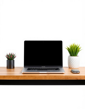Laptop computer with blank screen on wood desk isolated on white background