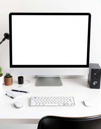 Workplace with blank screen computer, keyboard, mouse and other objects on white desk