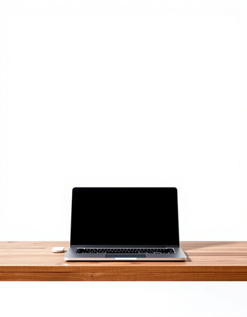 Laptop with blank screen on wooden shelf isolated on white background.