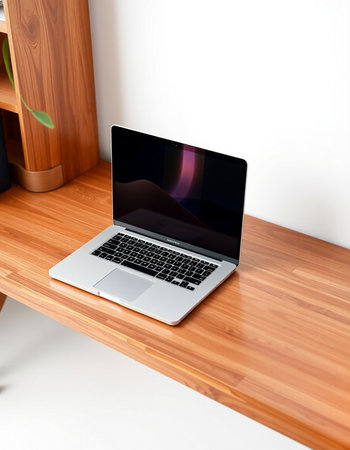 Laptop on a wooden shelf in the interior. 3d rendering