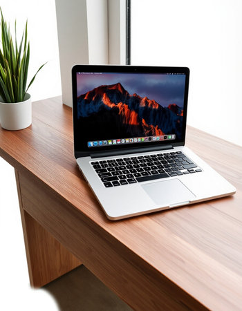 laptop on wooden table with mountain view. 3d rendering.の写真素材