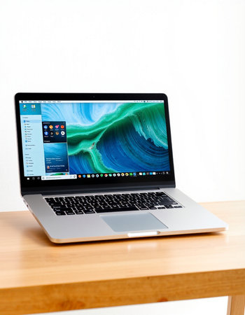 Website on MacBook Pro Retina in a room environment.