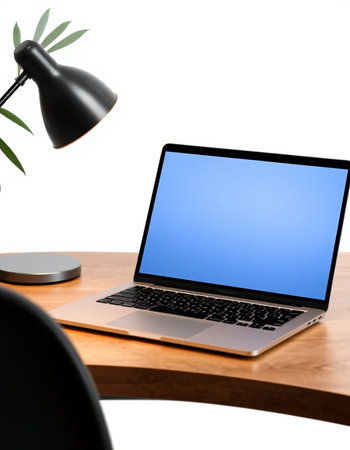 Laptop with blank screen on wooden desk isolated on white background.