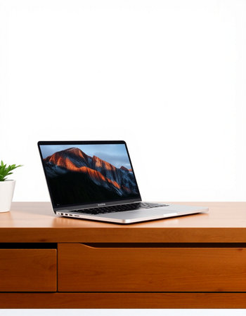 Laptop computer on wood desk isolated on white background with clipping path