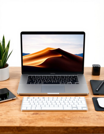 Modern workplace with laptop and office stuff on wooden table, clipping path includedの写真素材