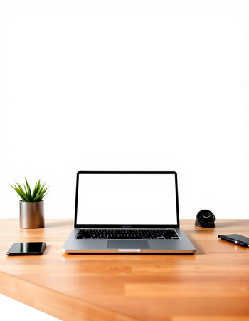 Laptop with blank screen on wood table with white background, stock photoの写真素材