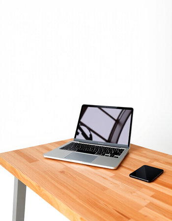 Laptop and smartphone on wooden table against white wall. 3d renderの写真素材