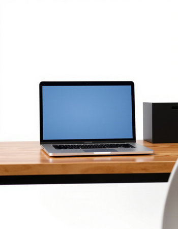laptop on wooden desk isolated on white background.